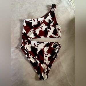 Skatie Nicole one piece in Dallas print